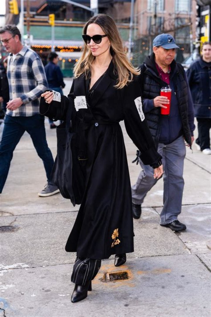 Angelina Jolie Looks Stunning in Stylish Black Form-Fitting Dress While Location Scouting on Rainy Rome Day