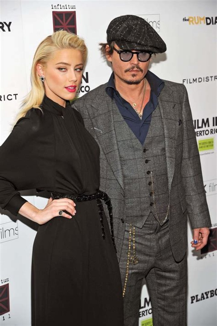 How tall is Amber Heard
