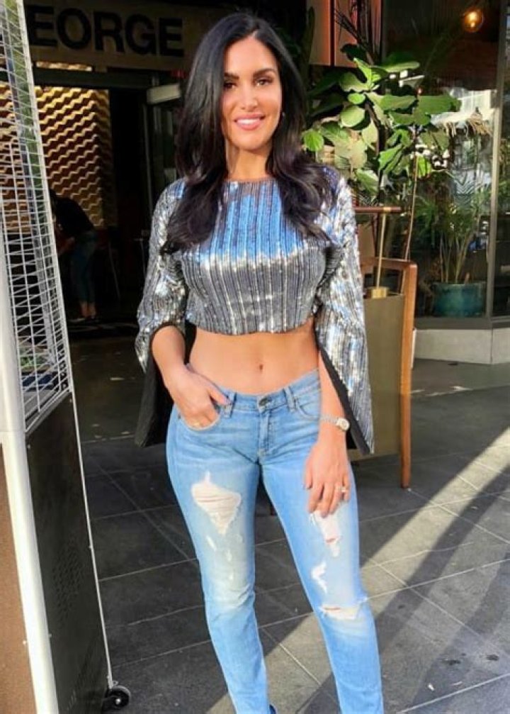 How tall is Molly Qerim