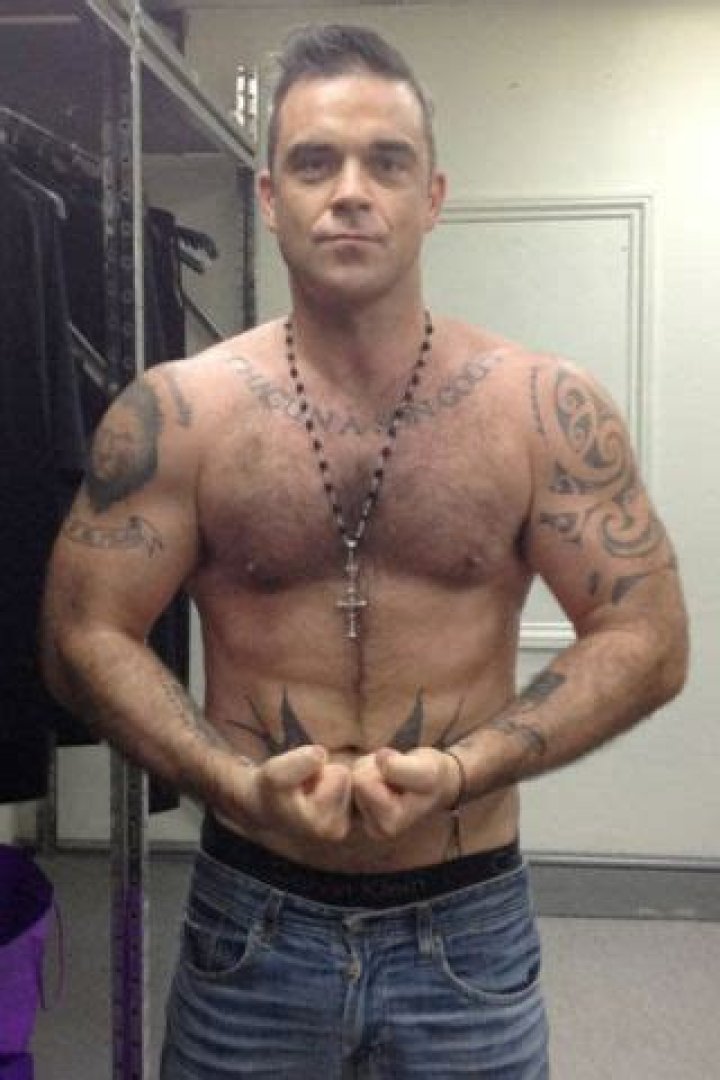 How tall is Robbie Williams
