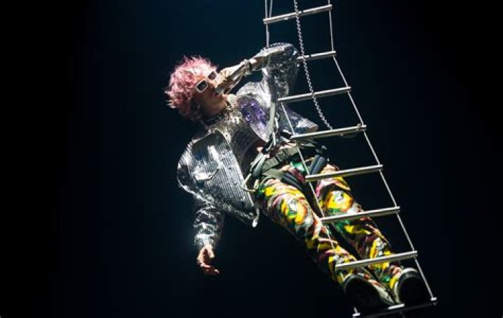 Machine Gun Kelly Is A Master Of Disguise In "Concert For Aliens"