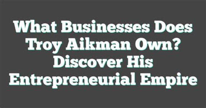 What businesses does Troy Aikman own?